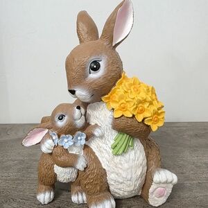 Easter Hugging Bunnies holding Flowers
